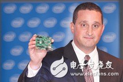 Jim Robinson, general manager of Intel â€™s Internet of Things Solutions and Diversified Marketing Division, showcases the motherboard reference design with Intel Quark SoC X1000