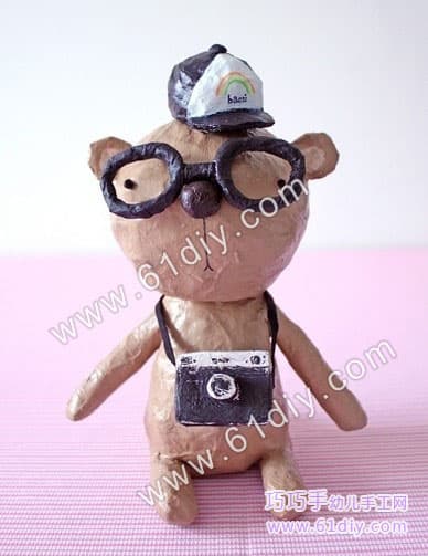 Old paper making cute cartoon bear model