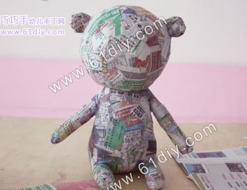 Old paper making cute cartoon bear model