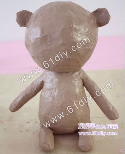 Old paper making cute cartoon bear model