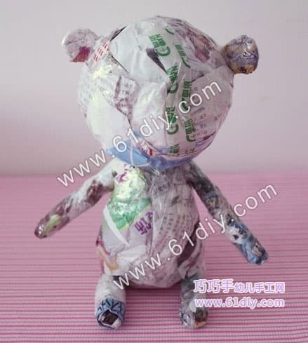 Old paper making cute cartoon bear model