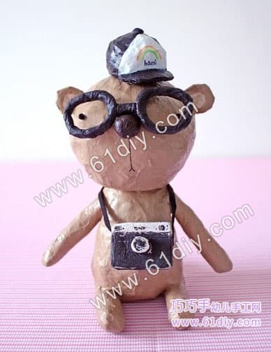 Old paper making cute cartoon bear model