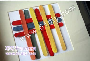 Popsicle stick making decorative painting