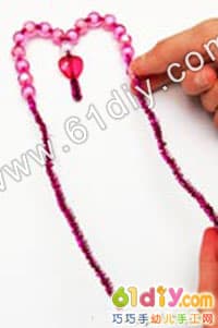 Twisted stick making beaded love stick