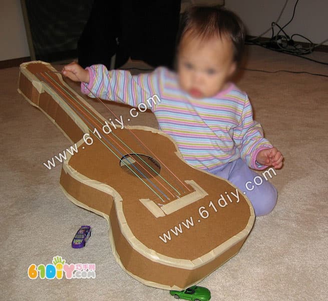 Cardboard making guitar