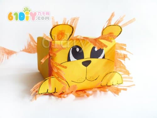 Handmade baby lion in carton