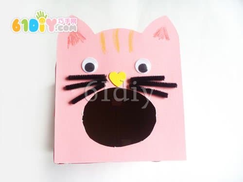 Carton handmade kitten eating fish