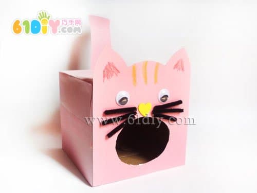 Carton handmade kitten eating fish