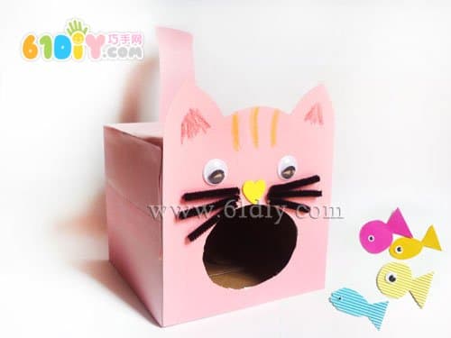 Carton handmade kitten eating fish