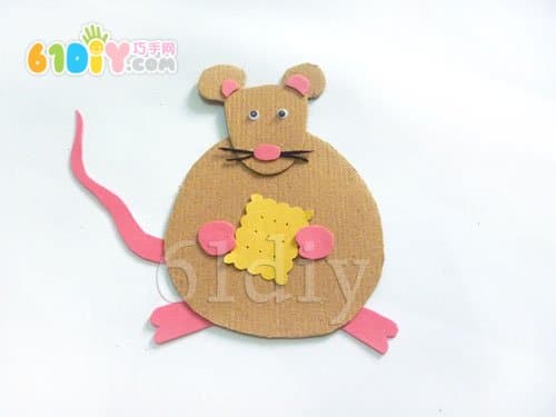 Little mouse eating biscuits handmade