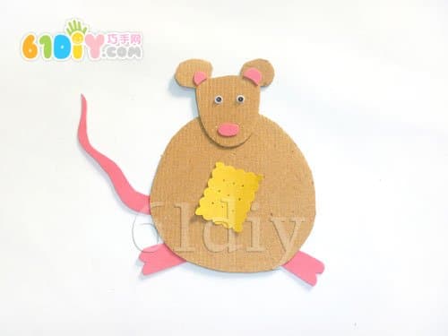 Little mouse eating biscuits handmade