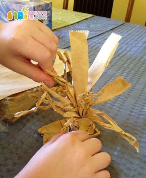 Paper bag waste making handmade tree