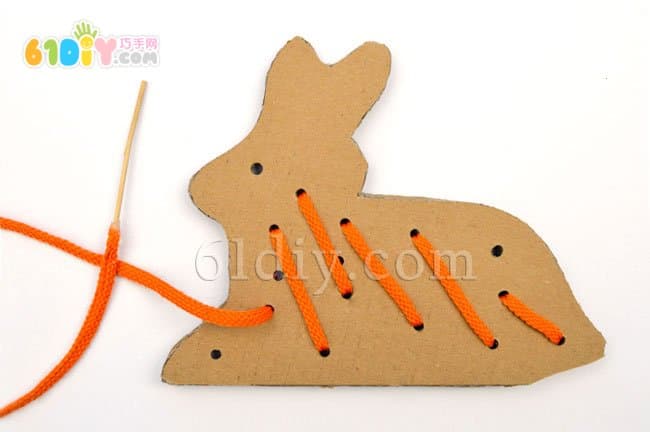 Cardboard waste making handmade rabbits