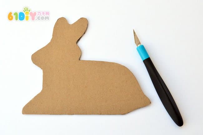 Cardboard waste making handmade rabbits