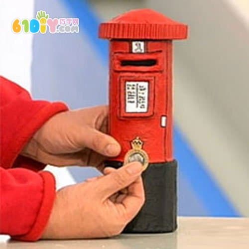 Potato chip tube turned into a mailbox piggy bank