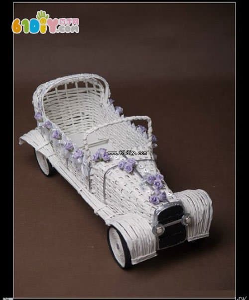 Waste paper weaving car handmade