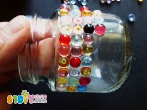 Glass bottle turned into a treasure DIY candlestick
