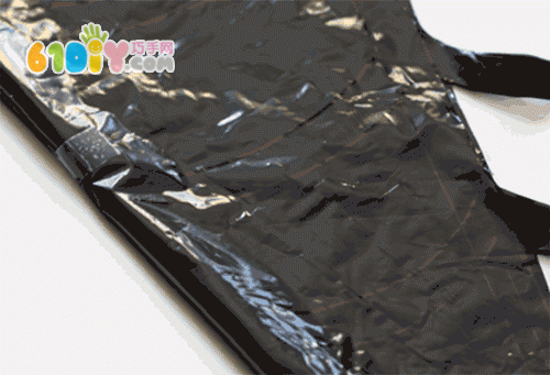 Black plastic bag paper-cut spider web
