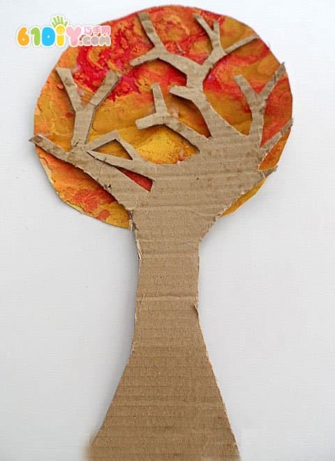 Waste cardboard making autumn tree