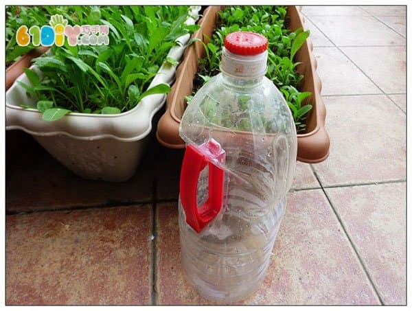 Plastic bottle waste making watering can