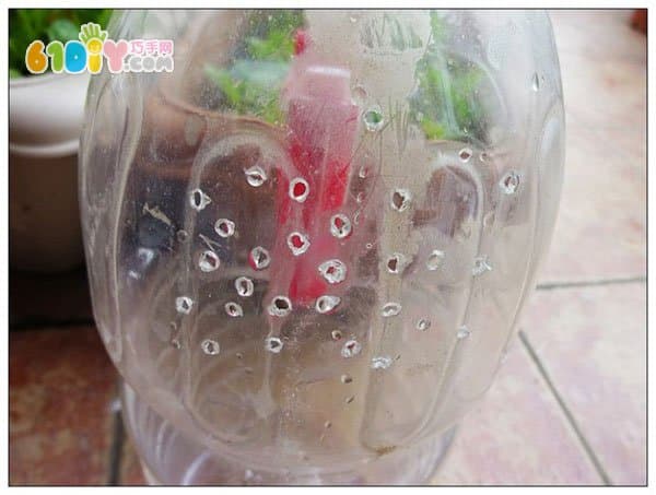 Plastic bottle waste making watering can