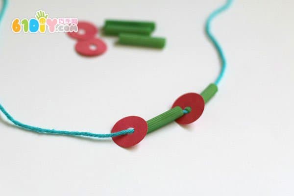 Child necklace making hungry caterpillar