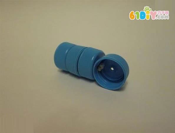 Plastic bottle cap changing robot toy