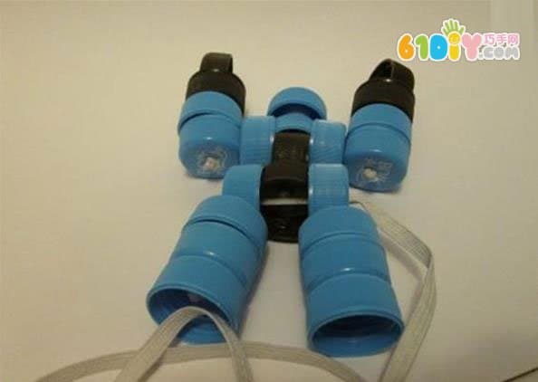 Plastic bottle cap changing robot toy