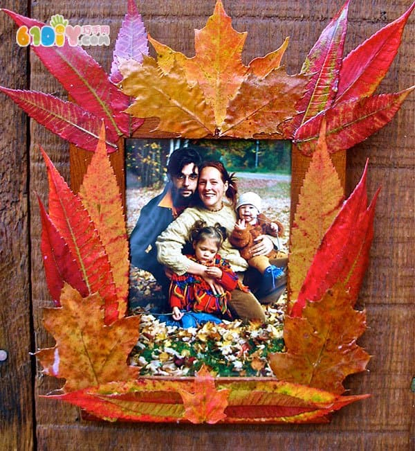 Autumn children handmade beautiful leaves photo frame