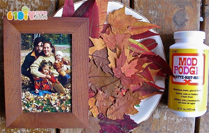Autumn children handmade beautiful leaves photo frame