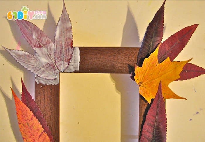 Autumn children handmade beautiful leaves photo frame