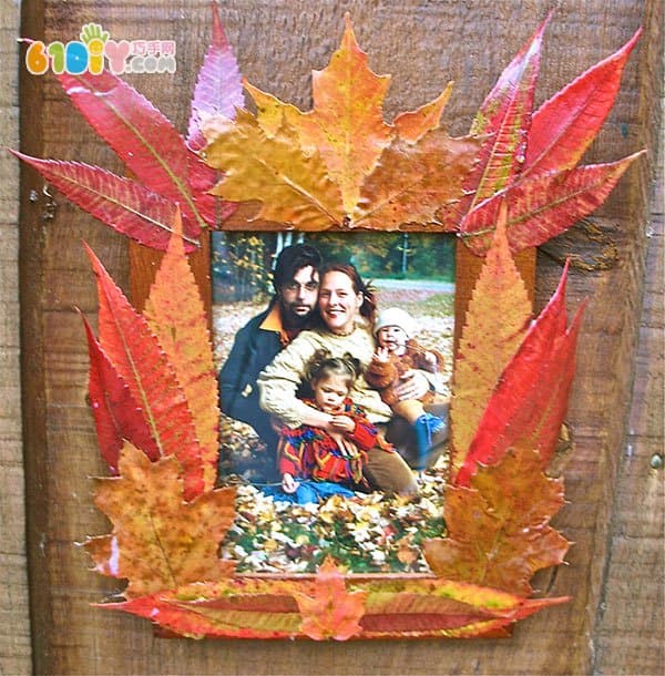 Autumn children handmade beautiful leaves photo frame