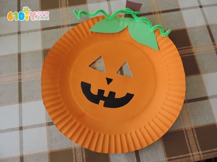 Halloween children making pumpkin man mask