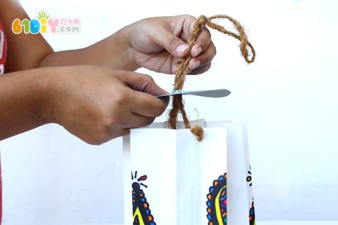 Children making hand drawn paper lanterns