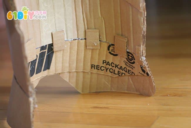 Waste cardboard armor artwork and production process