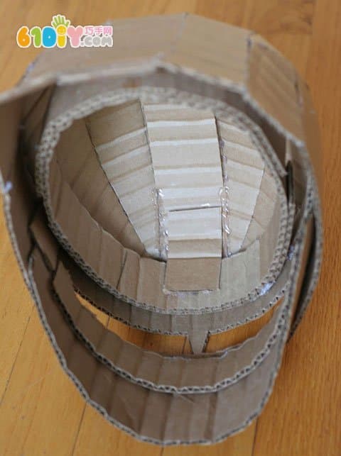 Waste cardboard armor artwork and production process