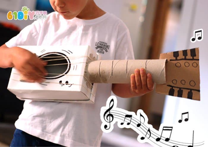 Children's creative DIY waste carton paper tube making guitar