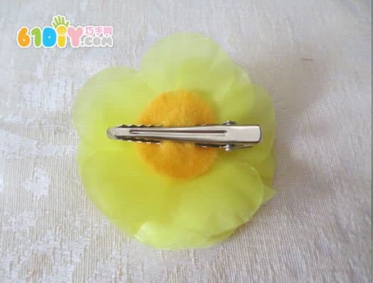 Making flower hair clips from waste materials