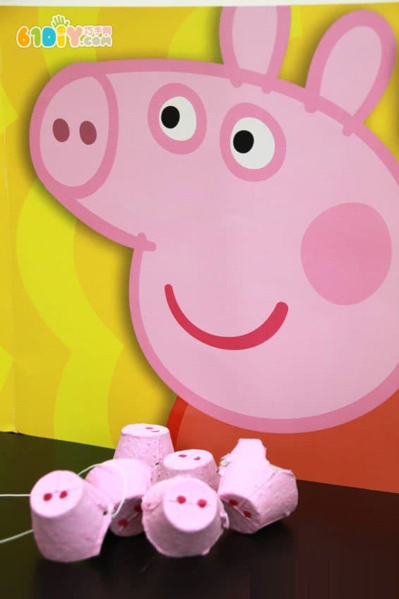 Children's handmade egg tray making pig nose