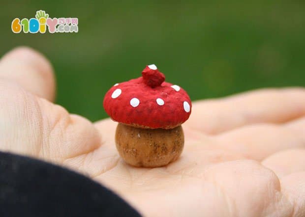 Young children use acorns to make small mushrooms