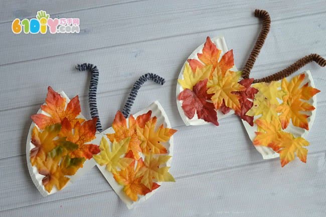 Children's autumn handmade butterfly made with leaves paper plate