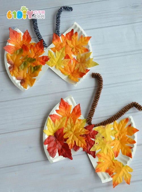 Children's autumn handmade butterfly made with leaves paper plate