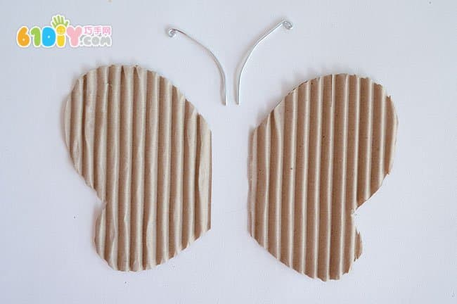 Waste cardboard newspaper making three-dimensional butterfly