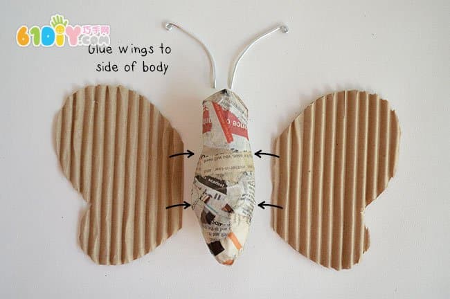 Waste cardboard newspaper making three-dimensional butterfly