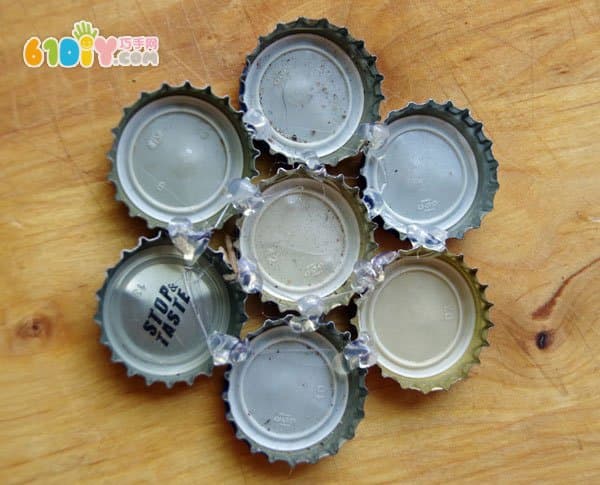 Waste use, beer caps, small flowers