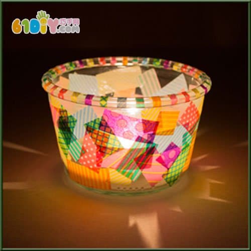 Children use colored tape to make Mid-Autumn Festival lanterns