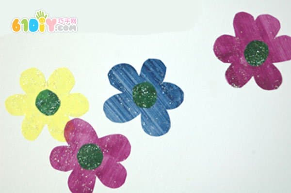 Children making wall decoration flowers