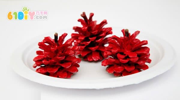 Child autumn handmade pine cone making apple