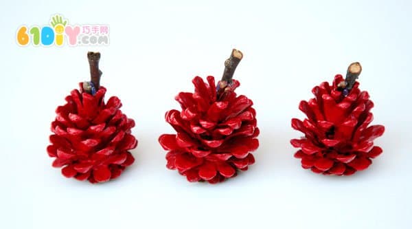 Child autumn handmade pine cone making apple