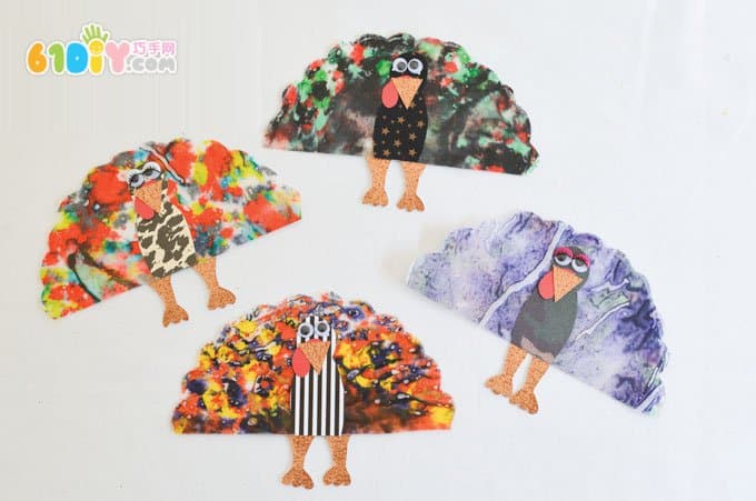 Children use crayon to make Thanksgiving turkey